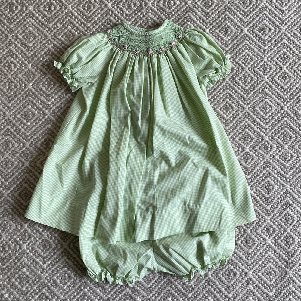 Bow Peep smocked pale green dress with light pink detail and matching bloomers